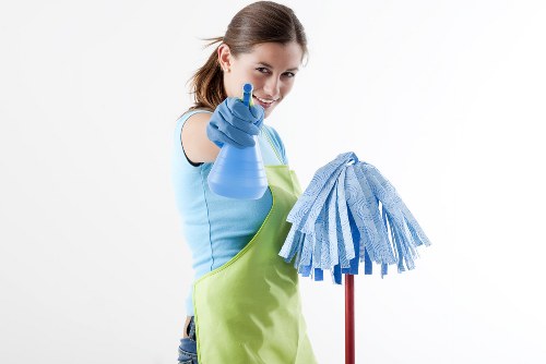 Professional carpet cleaning in progress with equipment and cleaned flooring
