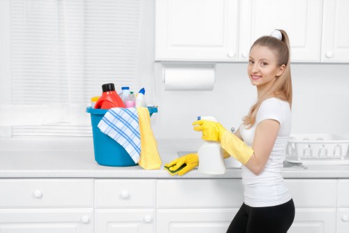 Professional carpet cleaner completing a safe and tidy cleaning service