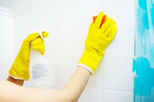 Cleaned carpet area with professional cleaning equipment nearby