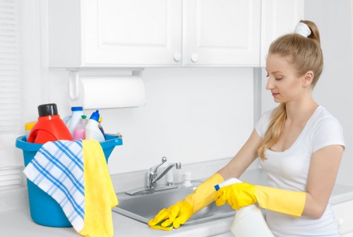 Technician preparing carpet cleaning treatment before service